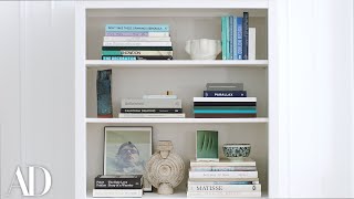 4 Ways To Fill Your Bookshelf With Style  Architectural Digest [upl. by Neffirg]