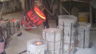 Pouring molten bronze into plaster molds Lost wax casting process Kilbaha foundry [upl. by Assille]