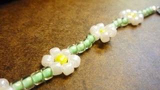 How to Make the Classic Daisy Chain Stitch  JewelryMaking Technique [upl. by Ahsinotna595]