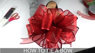 How to Make a Christmas Bow  Easiest BowMaking Method [upl. by Maurita]